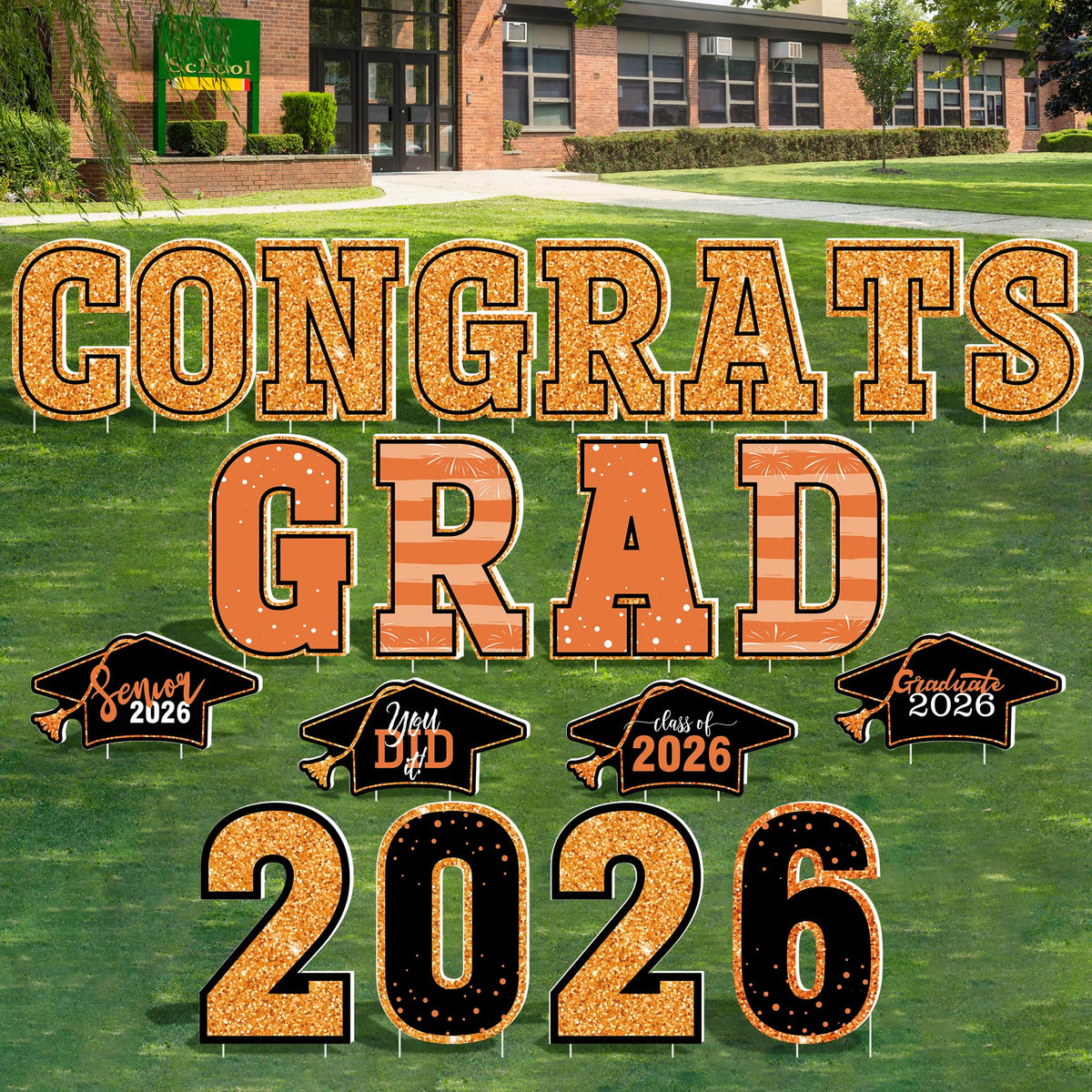 HOVACY front display of orange graduation signs showing curb appeal and bold celebration