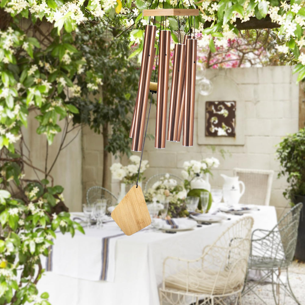 Howarmer chimes on patio creating relaxing outdoor atmosphere