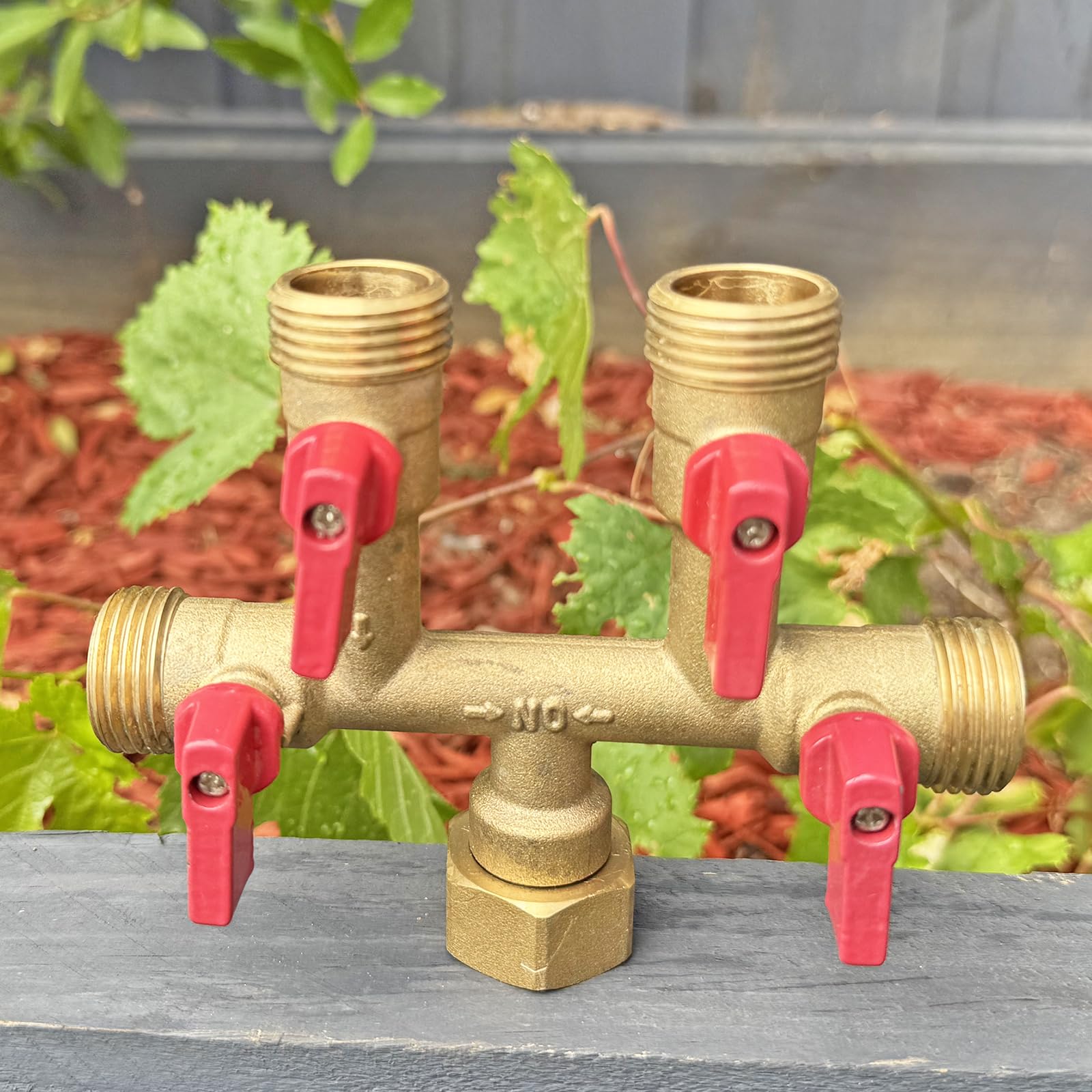 HQMPC in garden irrigation setup powering sprinklers and hoses for efficient watering