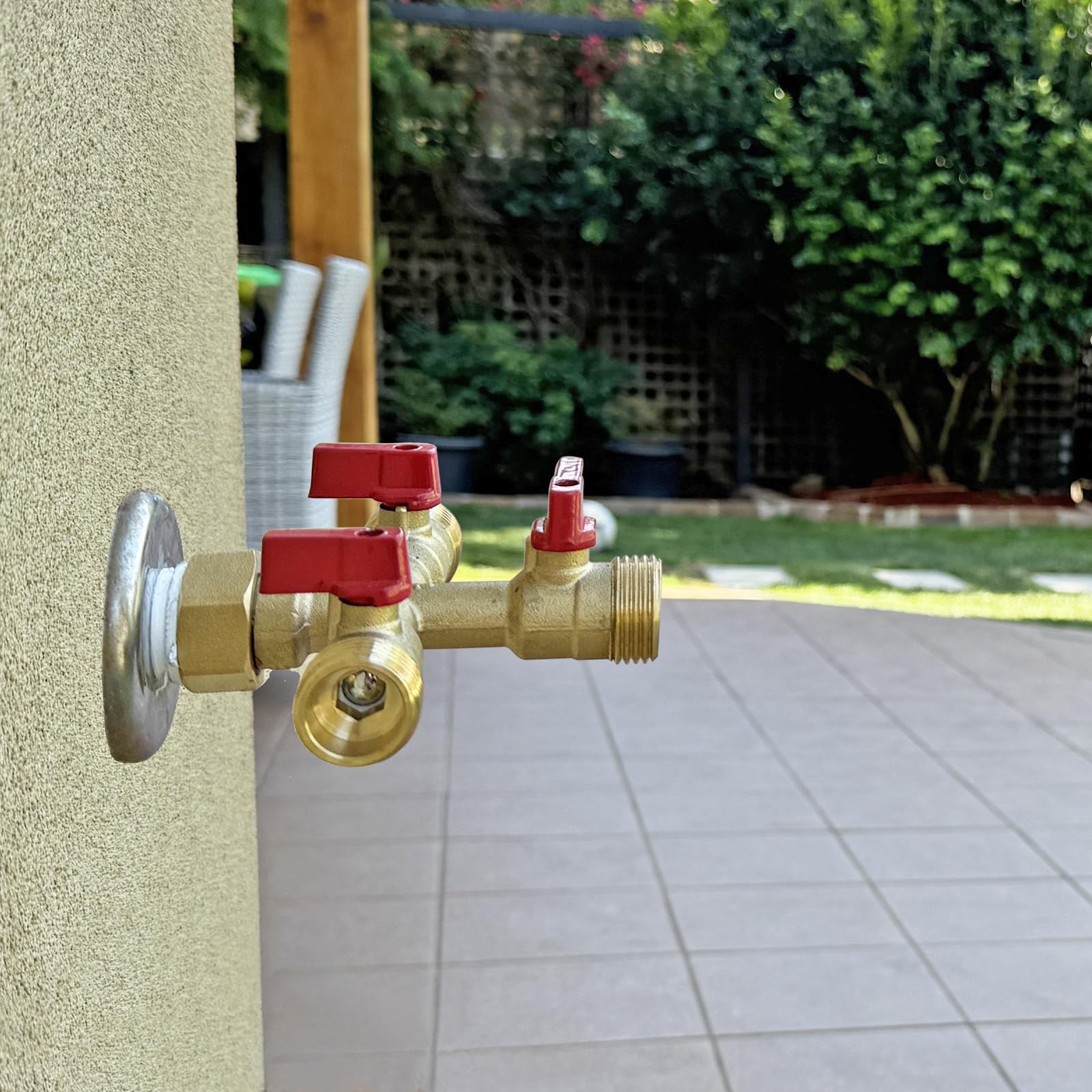 HQMPC connected to three hoses in use allowing simultaneous watering tasks