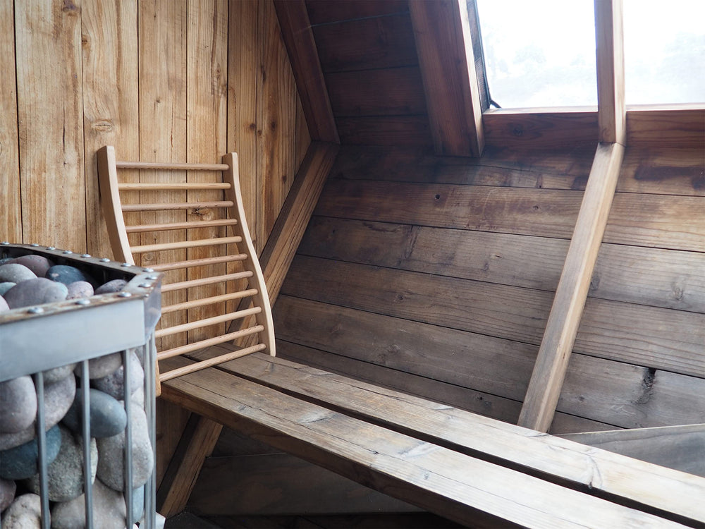 Home Sauna Experience in infrared sauna demonstrating safe heater clearance