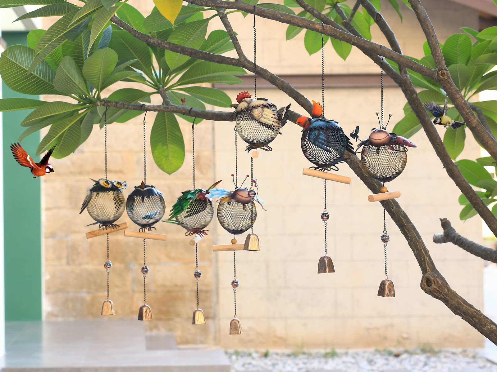HSHD owl feeder hanging in garden adding charm and bird activity