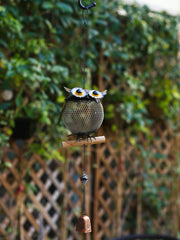HSHD feeder with songbird perched, attracting garden birds easily