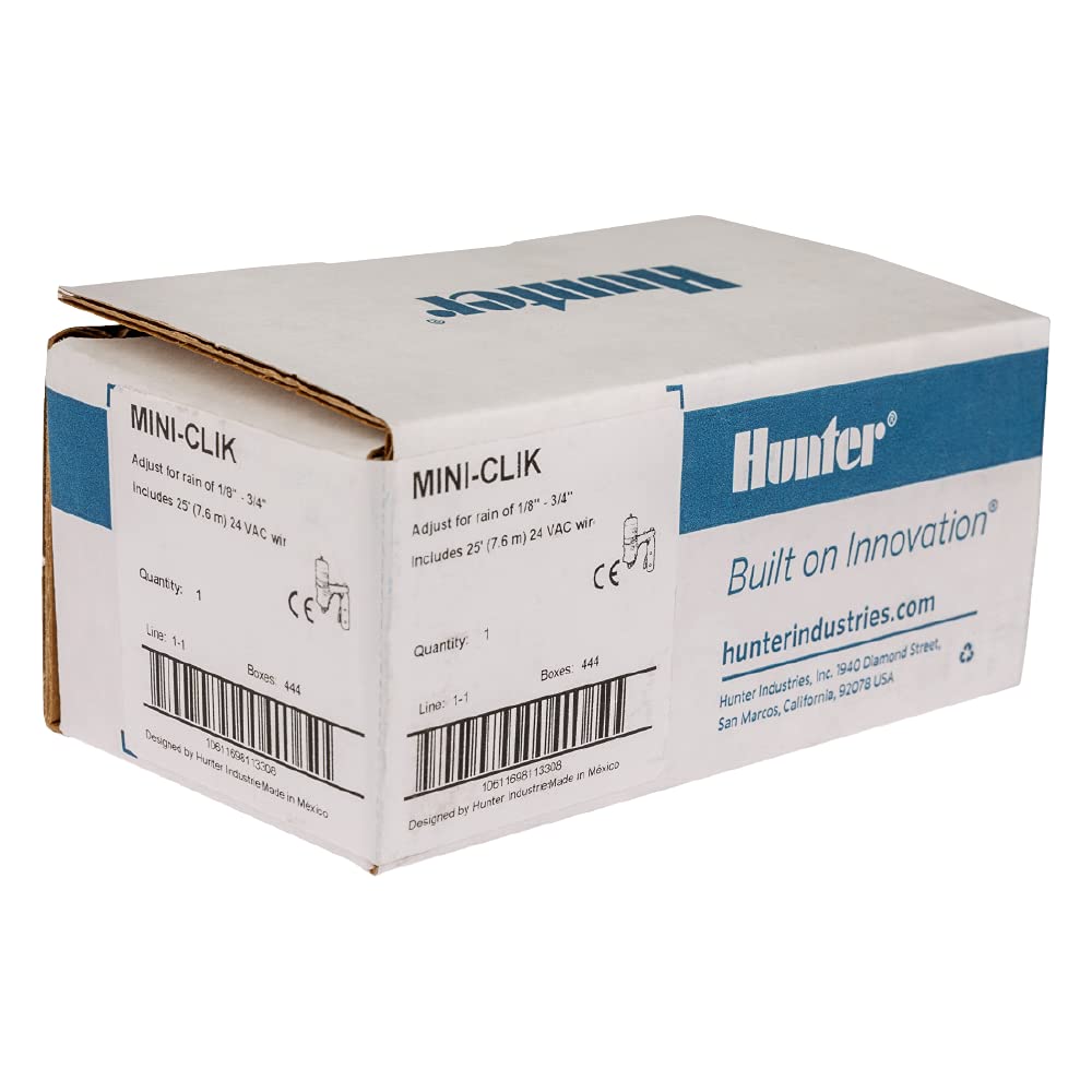 Hunter Mini-Clik beside irrigation controller for size comparison and effortless compatibility with Hunter systems