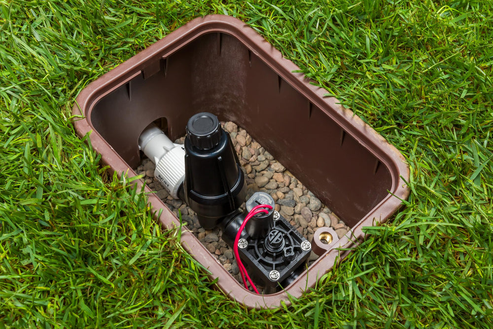 Hunter PCZ10140 scale comparison by valve showing compact size for easy system integration