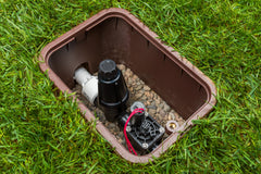 Hunter PCZ10140 scale comparison by valve showing compact size for easy system integration
