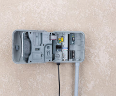 Hunter Pro-C mounted on exterior wall demonstrating simple outdoor installation