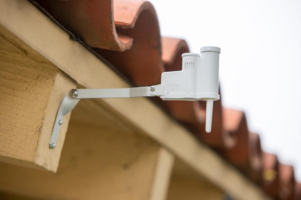 Hunter WRCLIK beside a hand showing compact size and low-profile benefit