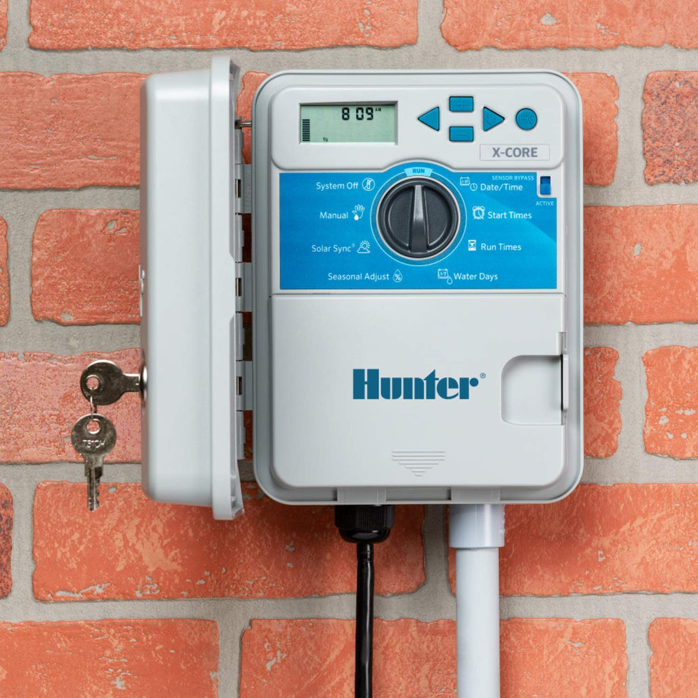 Hunter X-Core mounted on outdoor wall demonstrating durable weather resistance