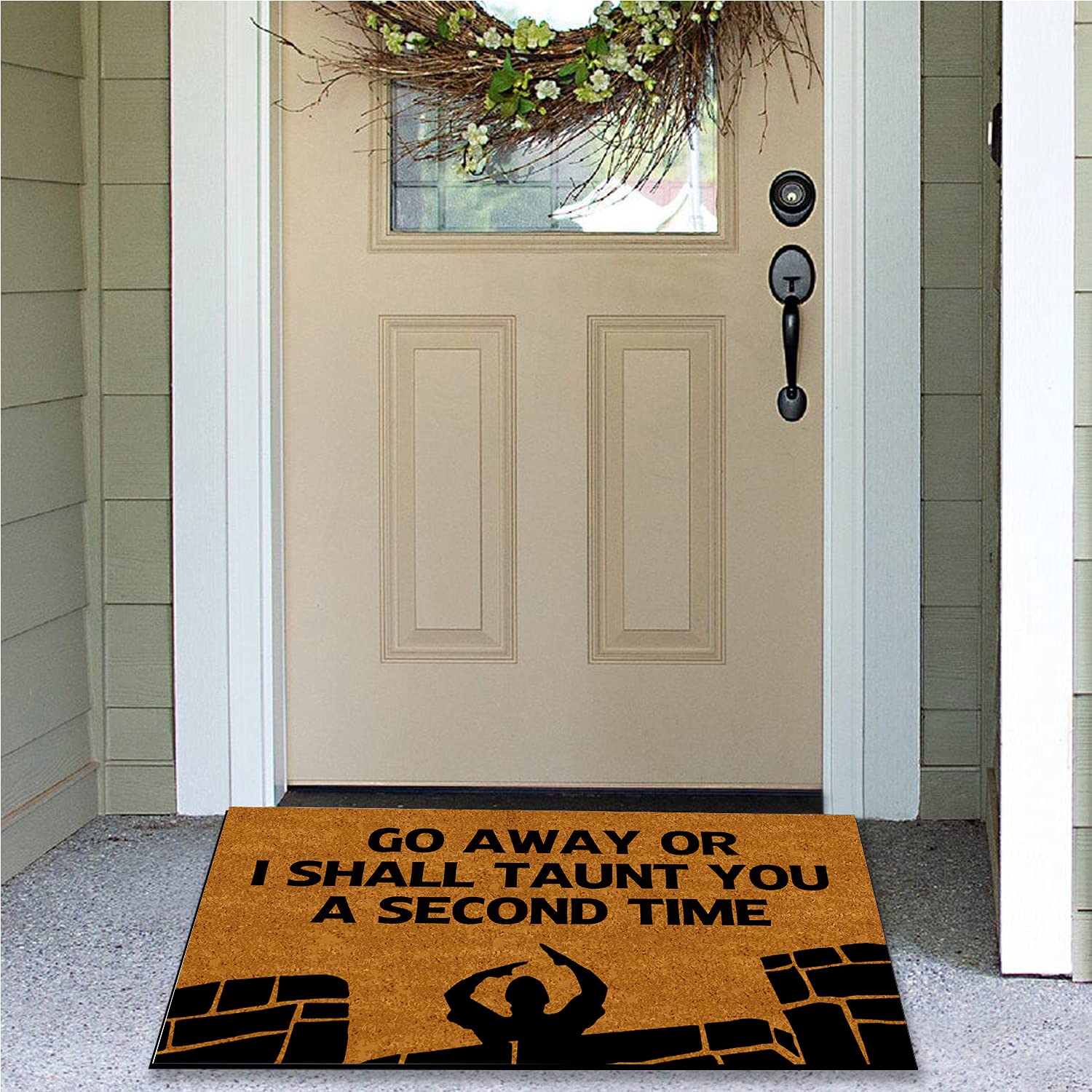 Hurdorak mat in use at front door showing non-slip placement and style