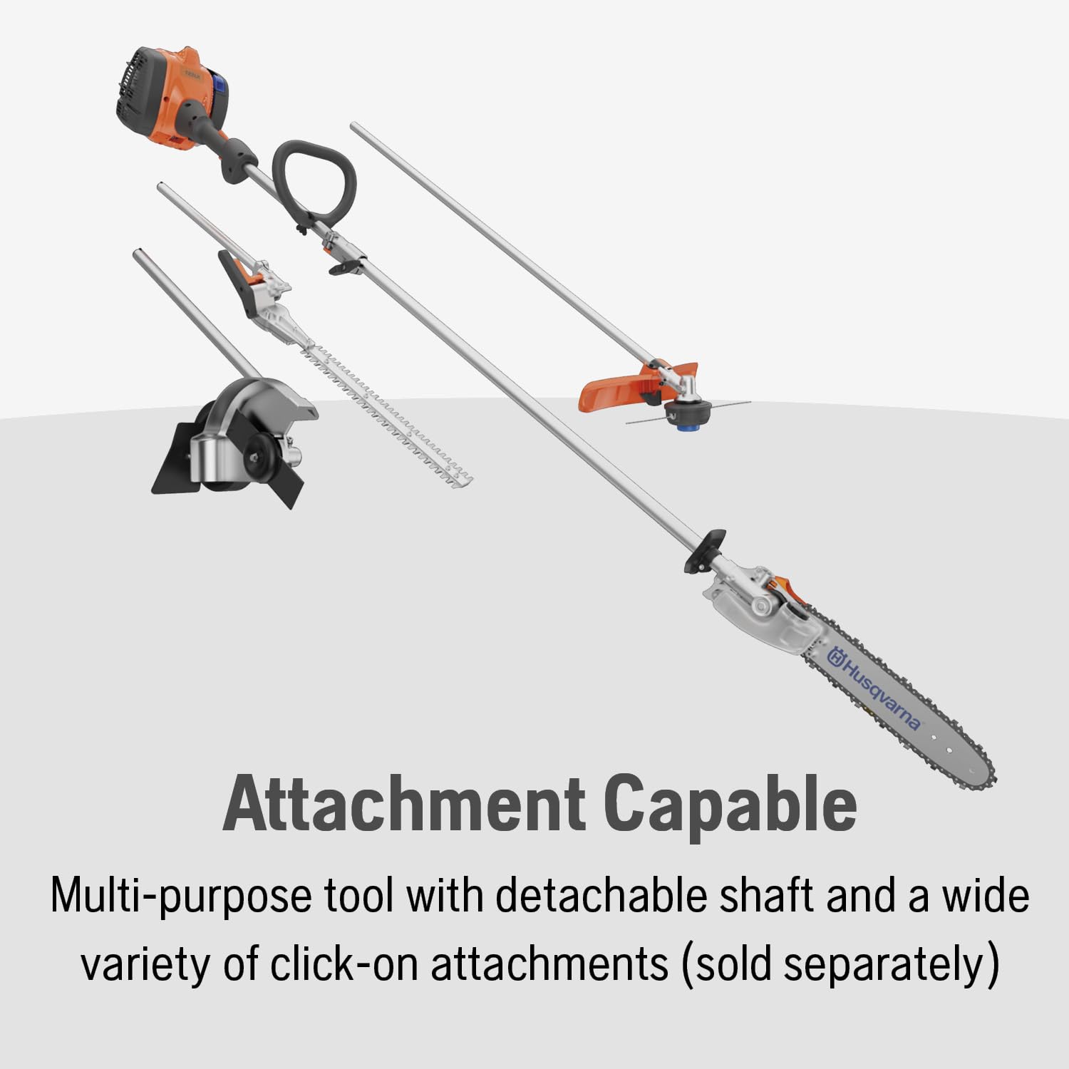 Husqvarna pole saw in use cutting high branch, safer ladder-free trimming