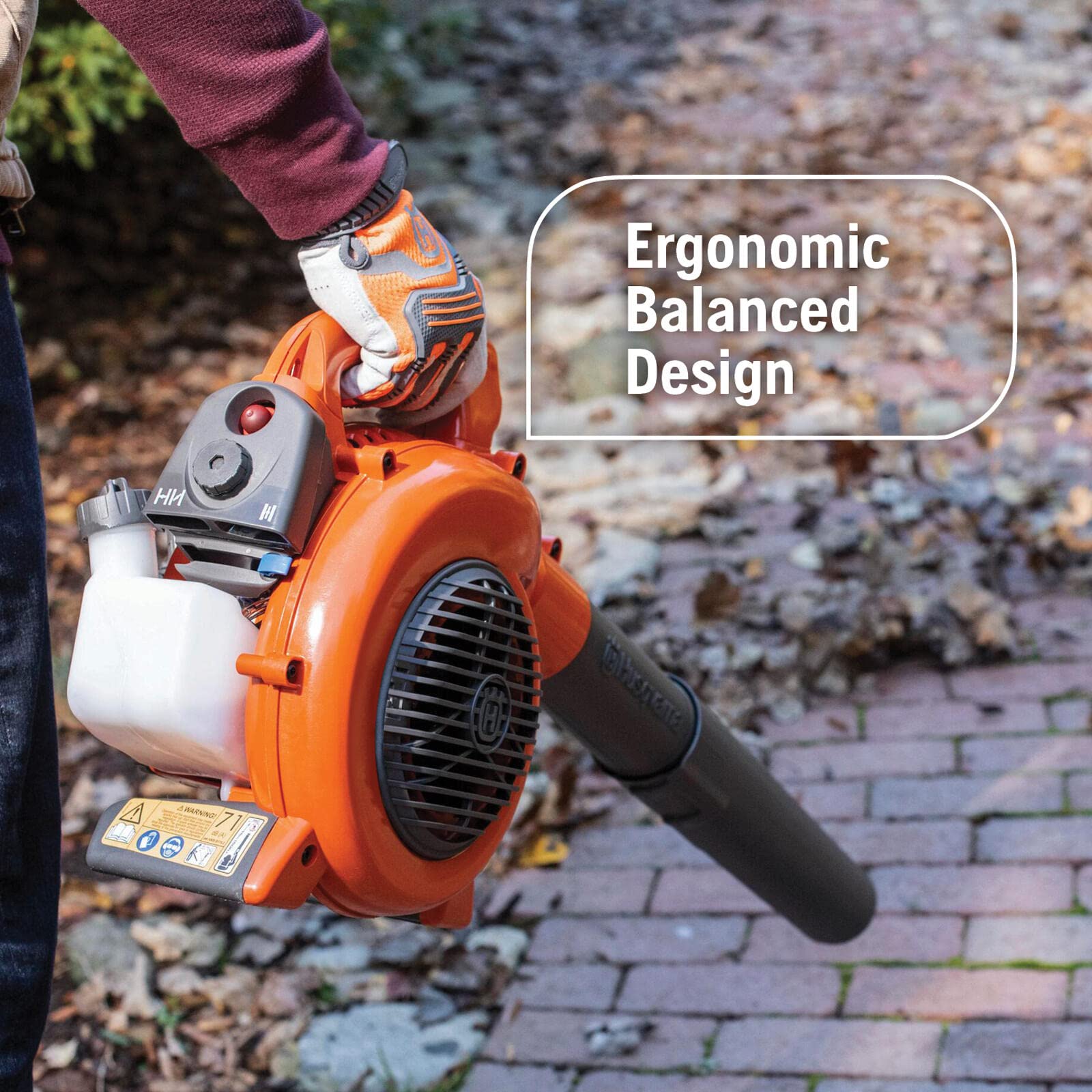 Husqvarna 125B clearing a flowerbed without disturbing plants