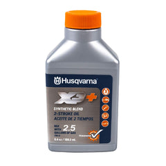 Husqvarna bottle close-up label showing OEM oil formula and easy pour nozzle benefit