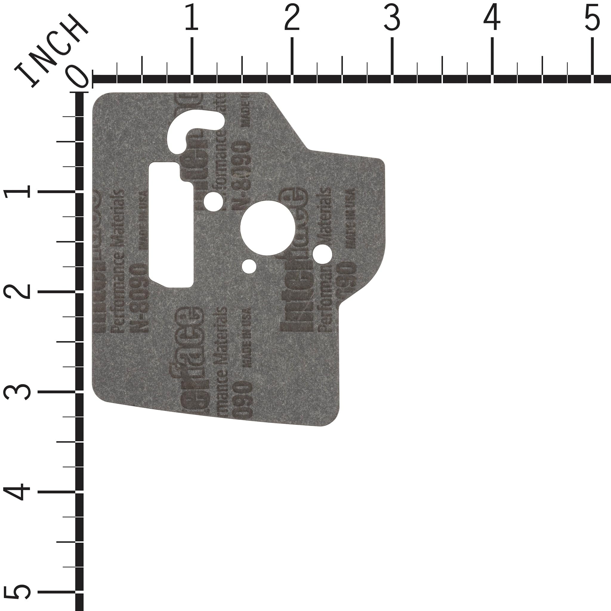 Husqvarna carburetor next to ruler for scale to verify correct sizing