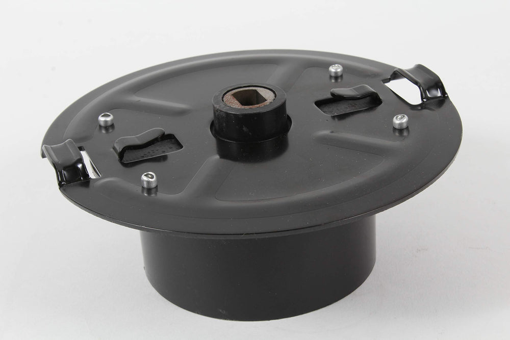 Husqvarna carrier plate installed in trimmer housing demonstrating restored performance