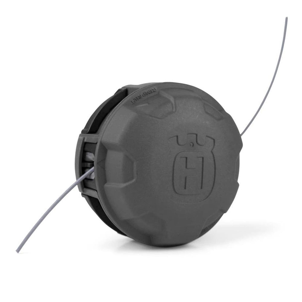 Husqvarna RapidReplace head front view showing compact design and fast reload benefit
