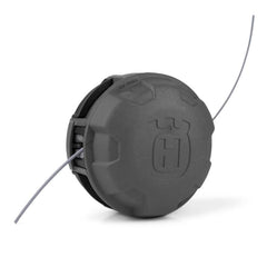 Husqvarna RapidReplace head front view showing compact design and fast reload benefit