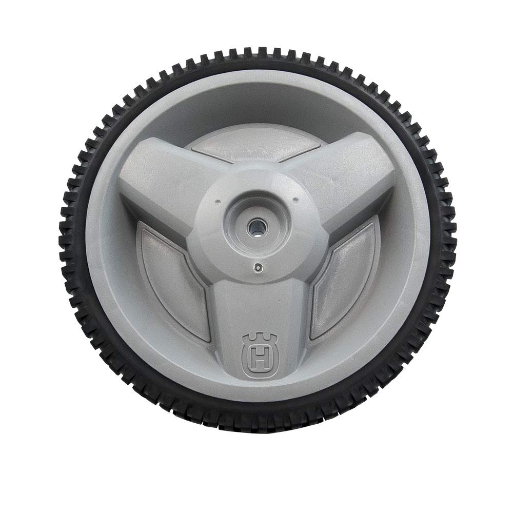 Husqvarna rear wheel mounted on mower demonstrating proper fit and stability