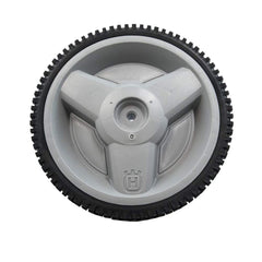Husqvarna rear wheel mounted on mower demonstrating proper fit and stability