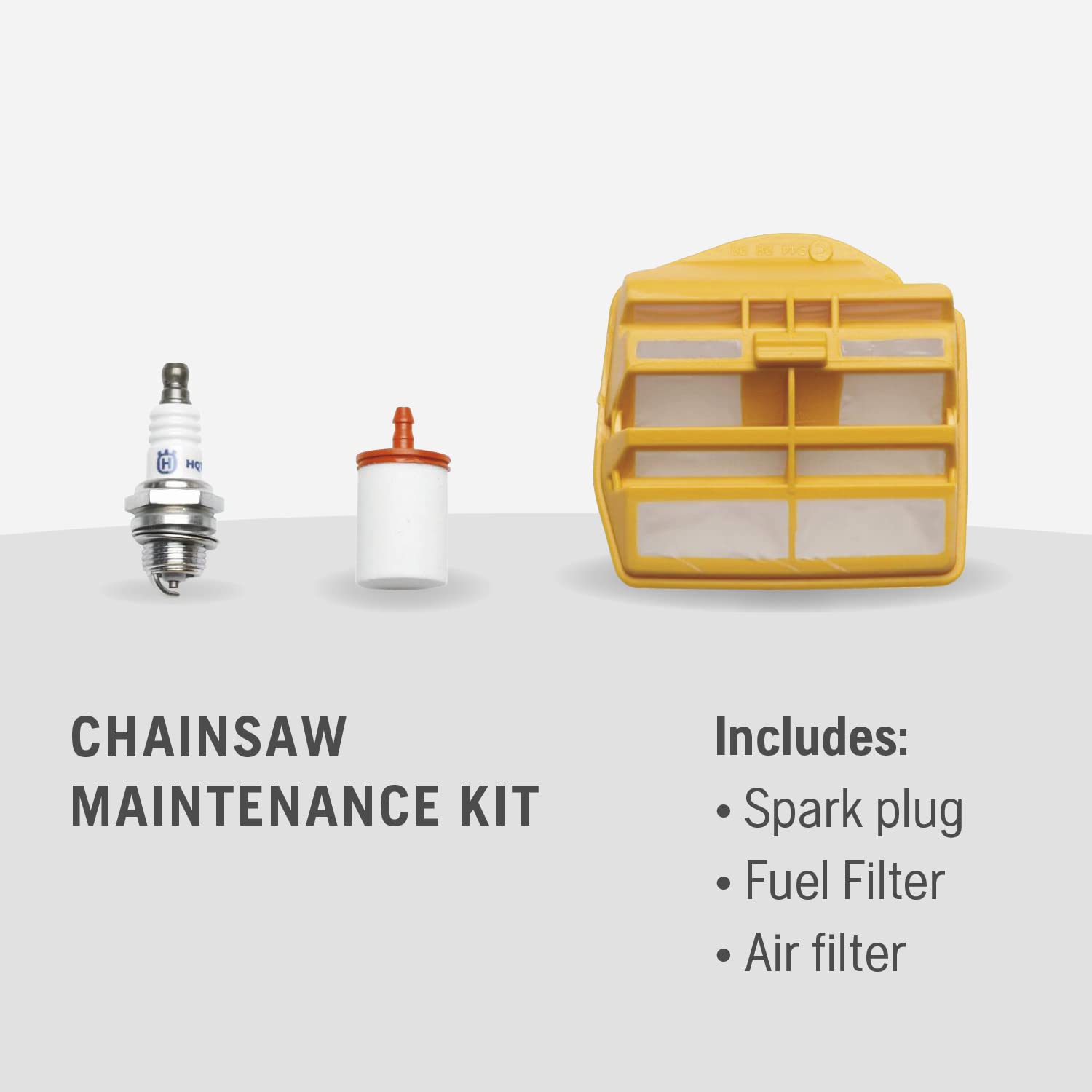 Husqvarna spark plug close-up showing electrode gap for reliable starts and consistent firing