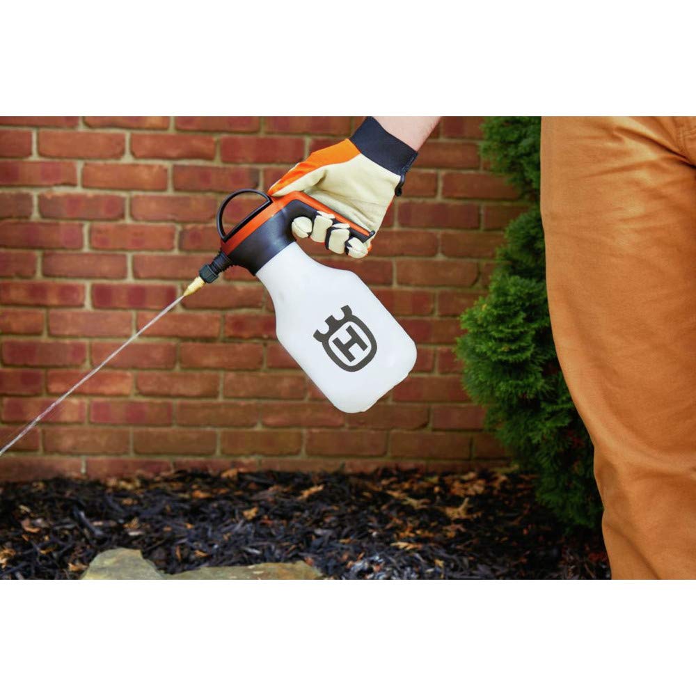 Husqvarna sprayer next to a hand showing portable 48 oz size