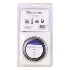 Husqvarna T25 cap and spool closeup showing removable design for simple reloading benefit