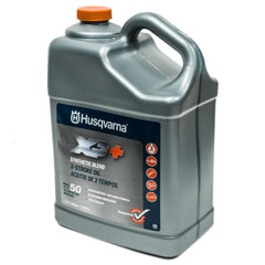 Husqvarna XP+ mixed fuel in measuring container for accurate 50:1 ratio