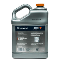 Husqvarna bottle pour-spout close-up for precise mixing and spill reduction