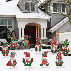 Huwena gnome signs inserted in a lawn creating bright holiday atmosphere for passersby