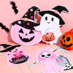 Huwena lawn stakes inserted in grass creating a visible Halloween yard display