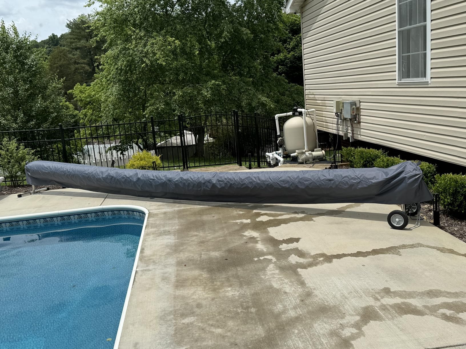 HWmatyCover next to person and reel showing 18FT scale and coverage
