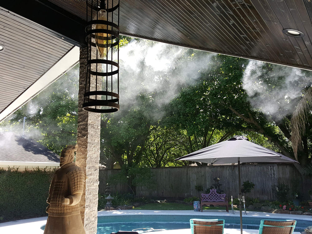 Hydrobreeze misting tube mounted on patio rail demonstrating targeted cooling benefit