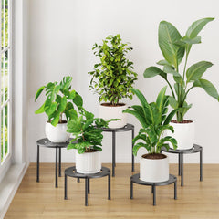 iDavosic.ly front view of black metal plant stand showing sleek profile and support