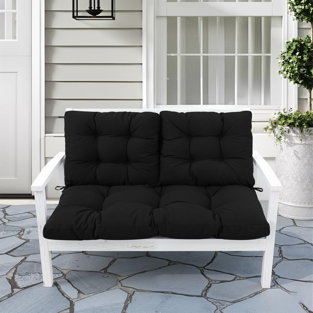 idee-home cushions styled on a patio loveseat showing added comfort and outdoor use