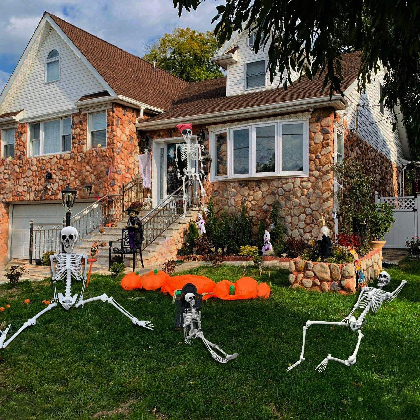 IDMOP yard scene at night with skeleton and lights showing atmospheric Halloween impact
