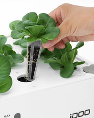 iDOO plant food vials and pod labels displayed for easy dosing and tracking