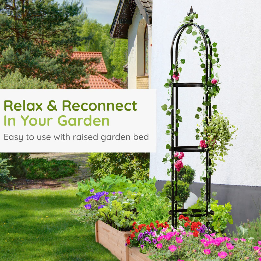 IDZO obelisk in garden setting adding architectural interest and visual focal point