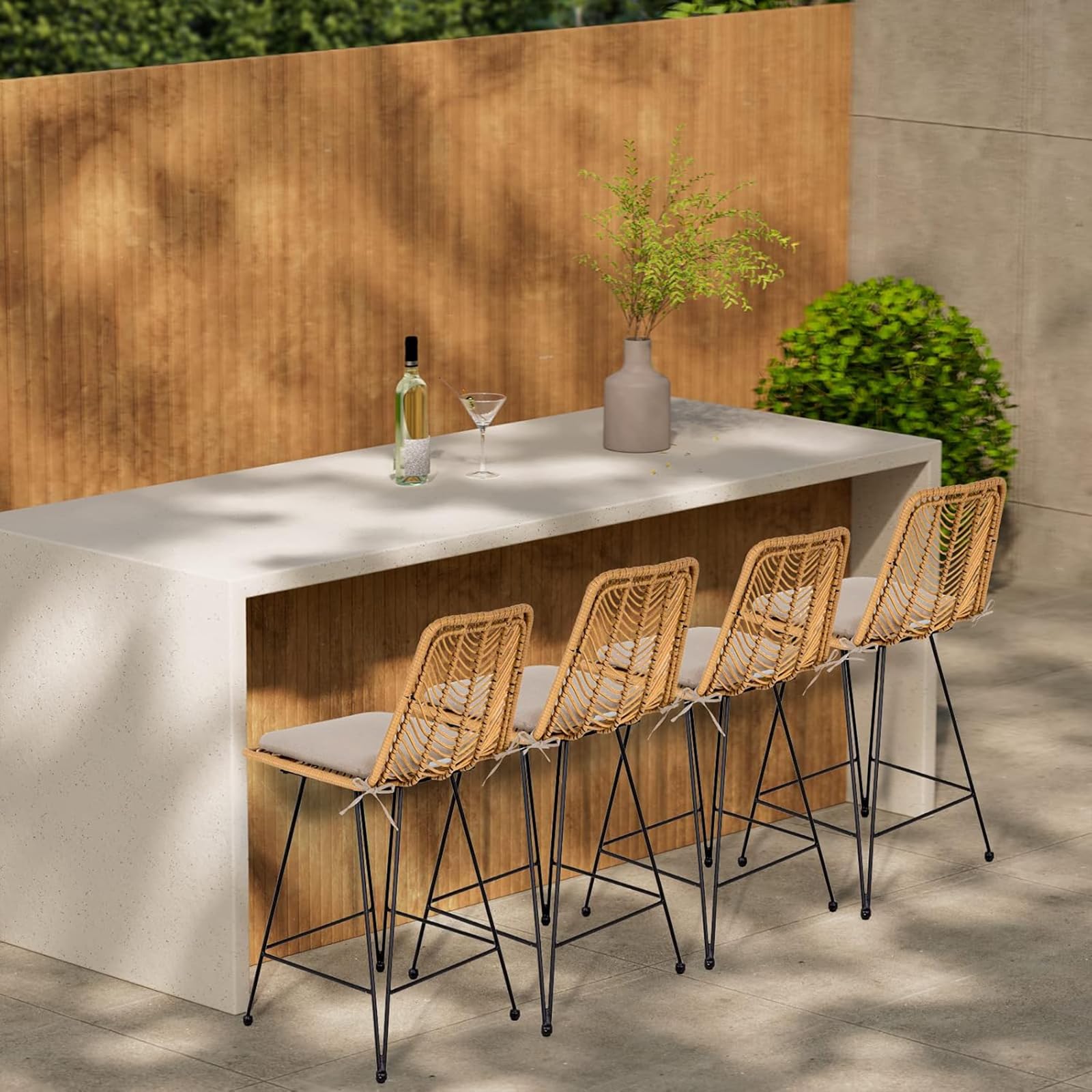 IDZO pair of bar stools on a patio demonstrating outdoor use and elegant entertaining setup