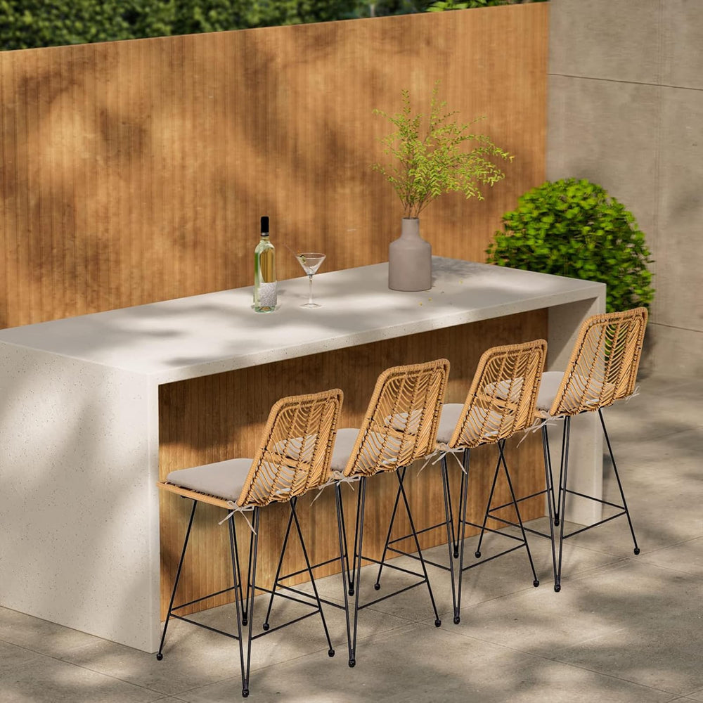 IDZO pair of bar stools on a patio demonstrating outdoor use and elegant entertaining setup