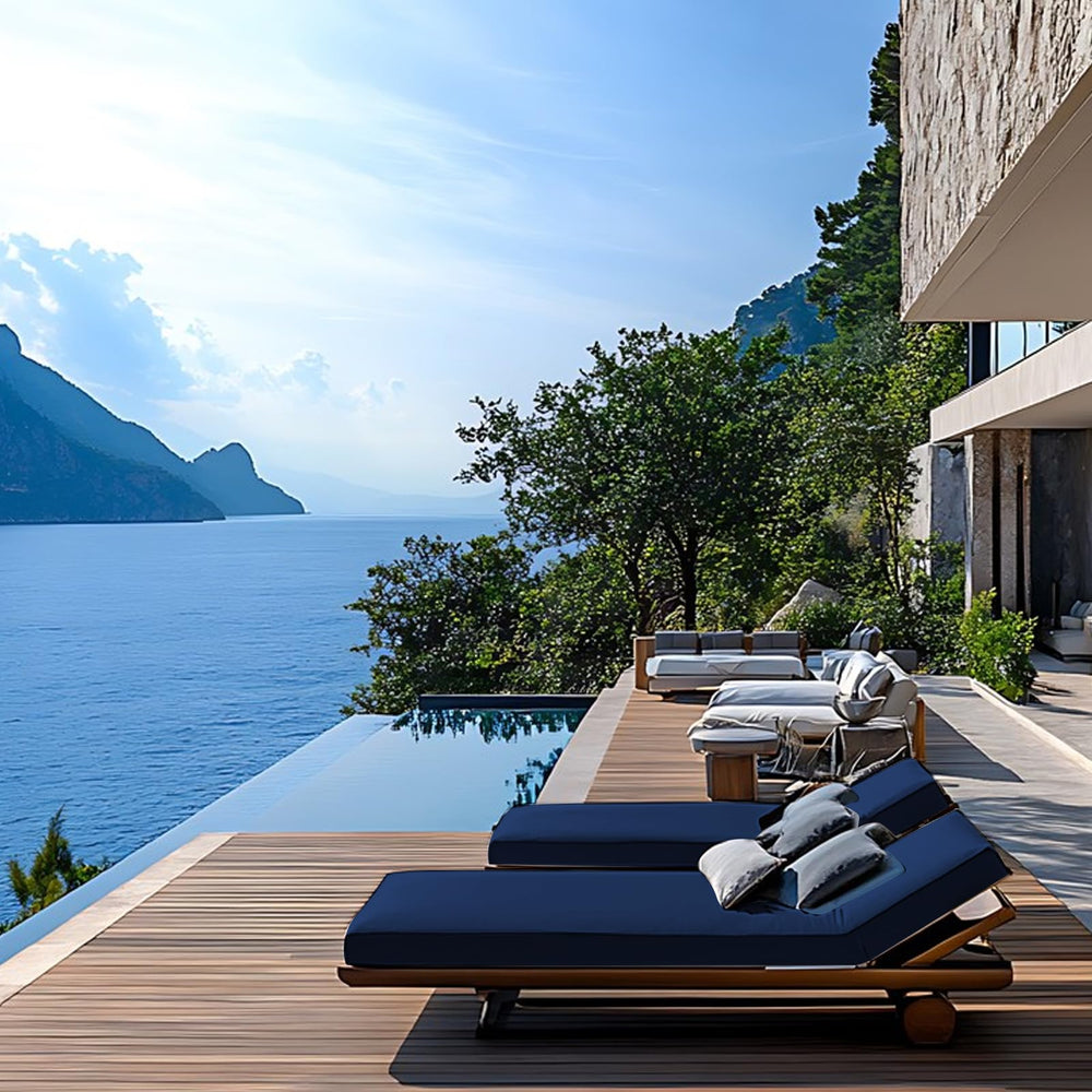 Iheqard lifestyle shot by the pool showing comfortable lounging and easy maintenance
