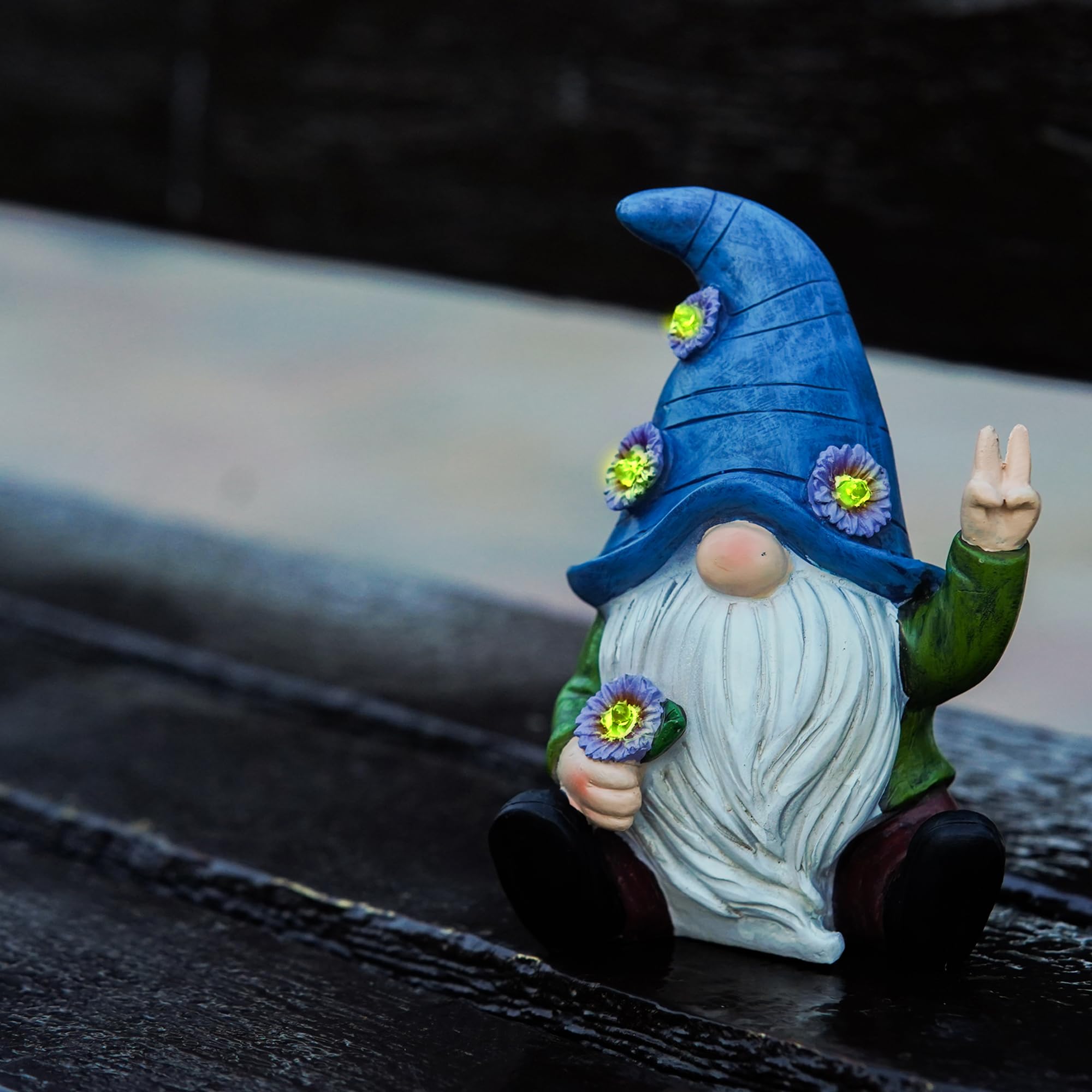 IMPECCABLE GOODS gnome on porch adding welcoming decorative light