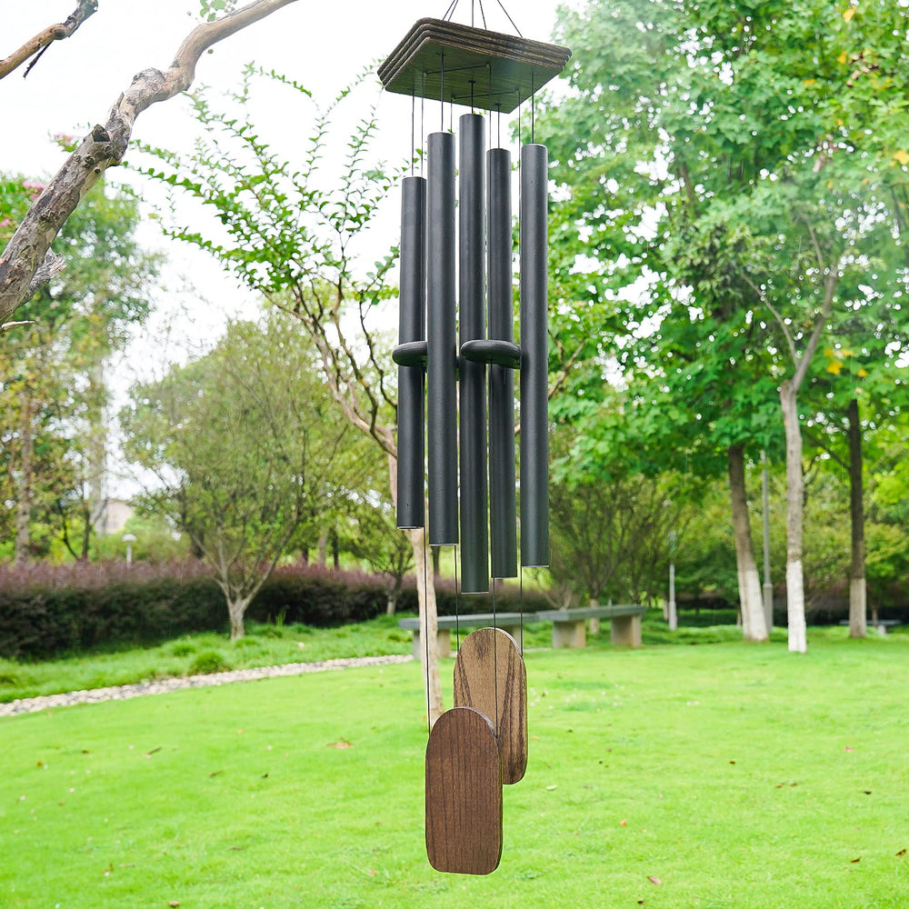 Implication next to a tree showing scale and how the deep tone carries across yards