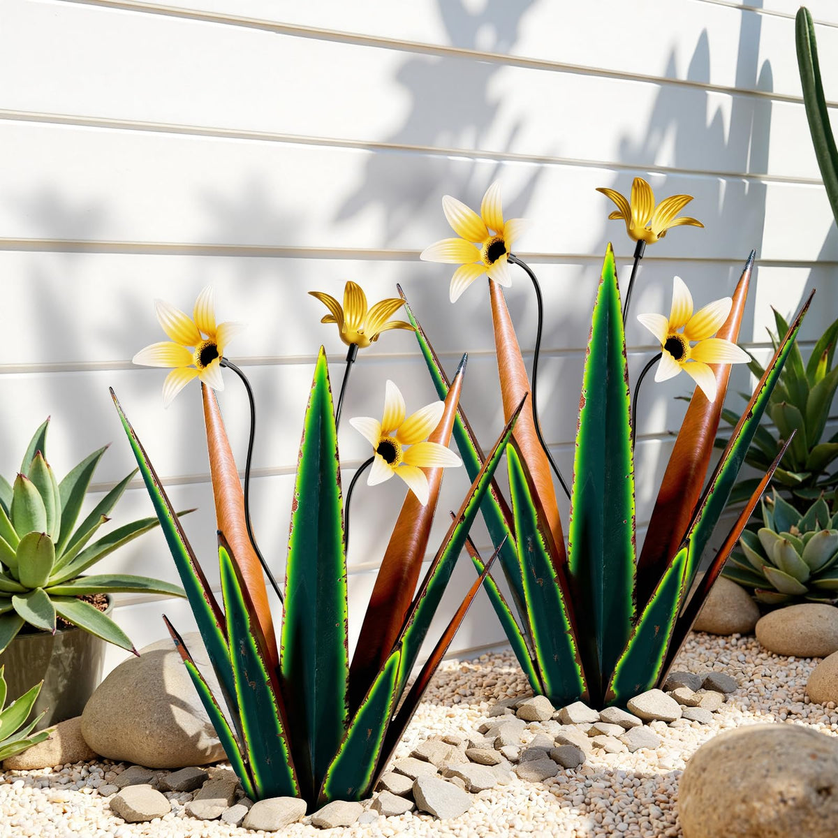 inihpocv front view of two green agave sculptures showing silhouette and balance