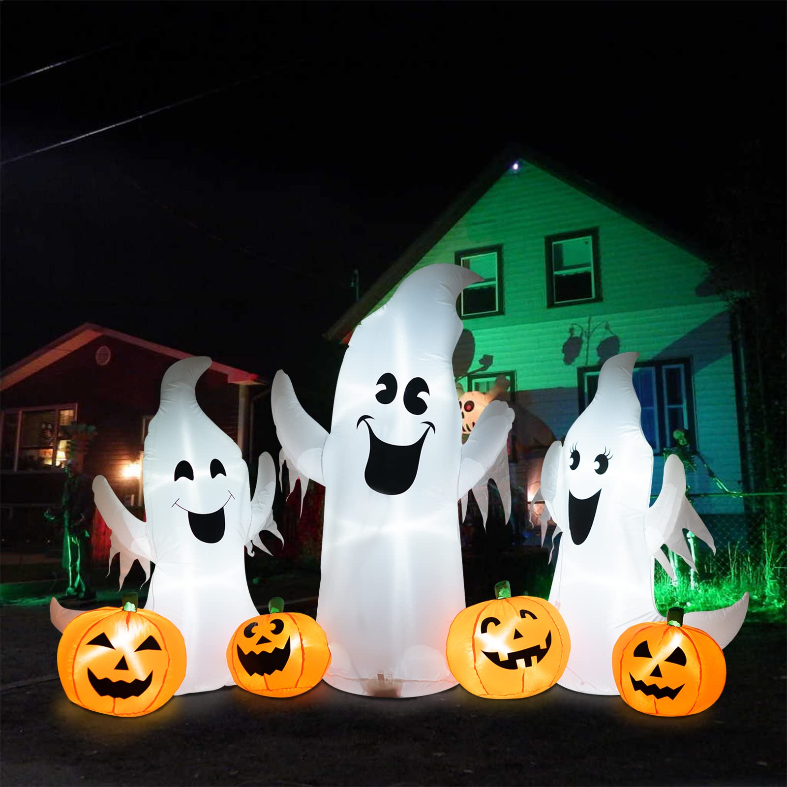 inslife nighttime yard display lit up, eye-catching Halloween atmosphere
