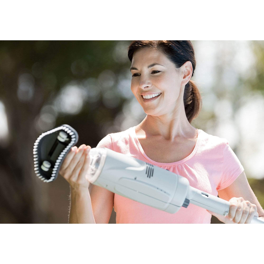 Intex vacuum next to pool pole showing scale and lightweight handling