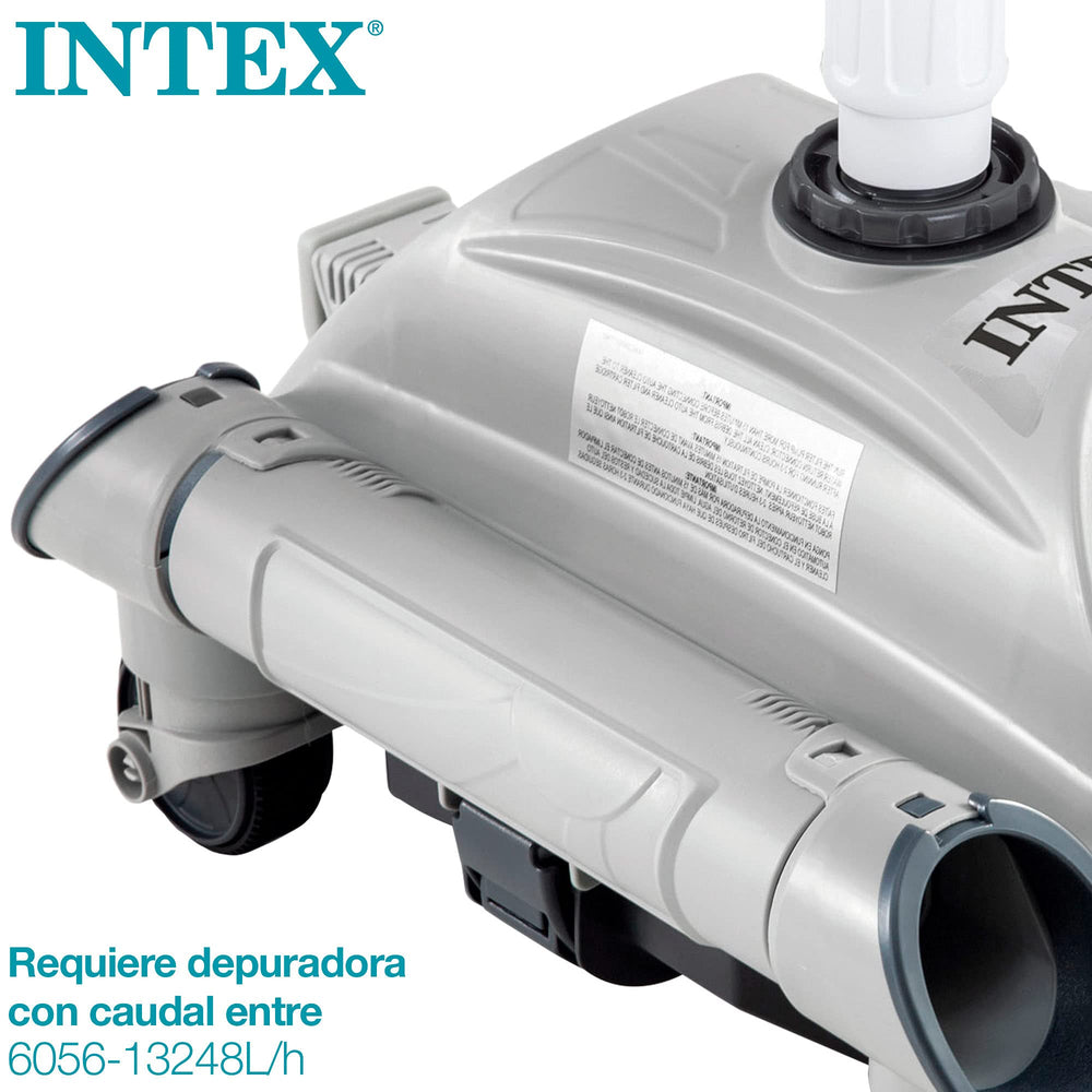 Intex cleaner next to pool ladder for scale showing compact size and space-saving benefit