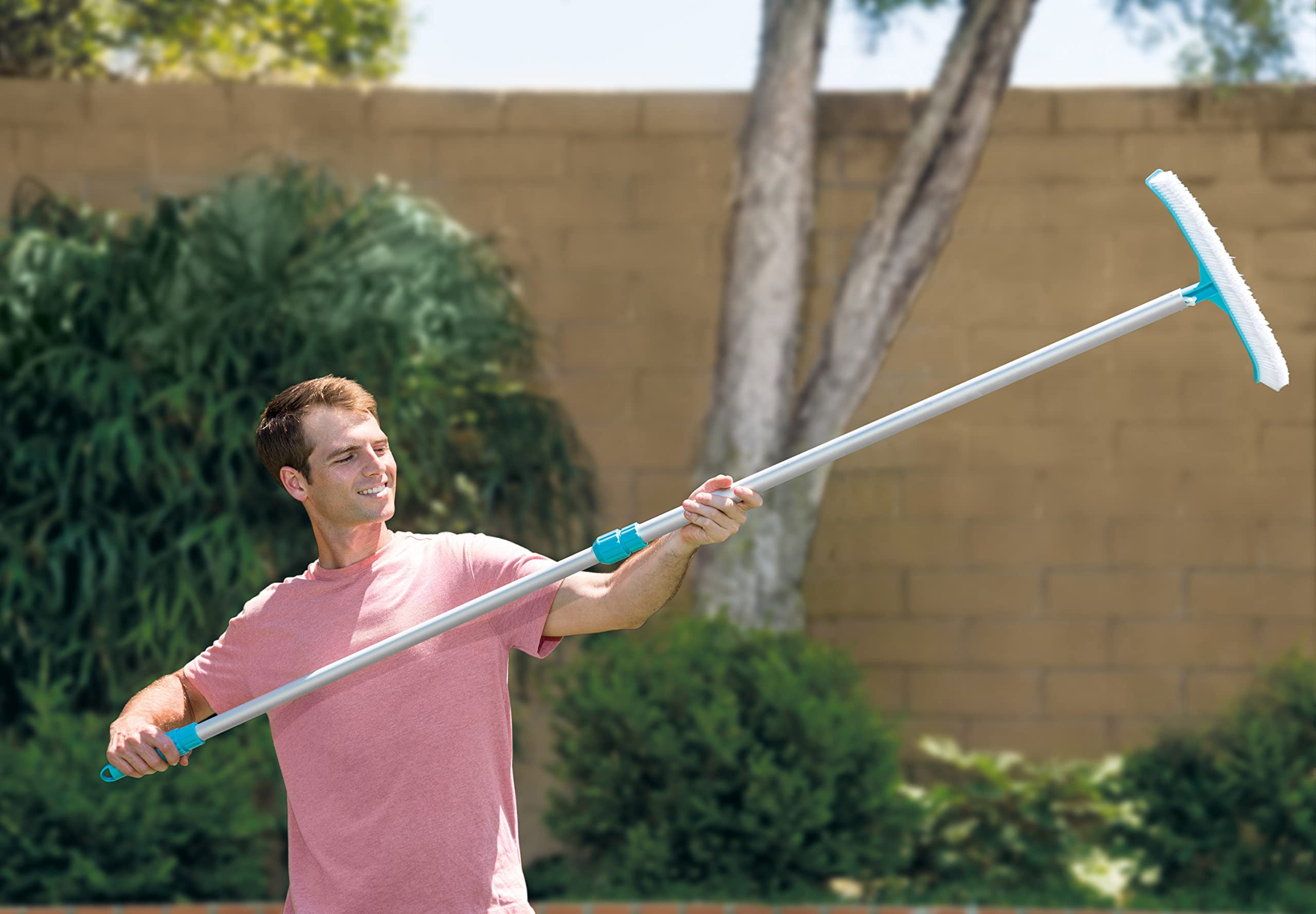 Intex curved wall brush bristles close-up lifting algae and grime