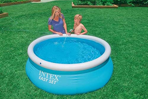 Intex Easy Set beside person for scale demonstrating compact footprint benefit