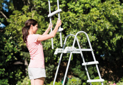 Intex ladder installed in above‑ground pool demonstrating easy entry and stability