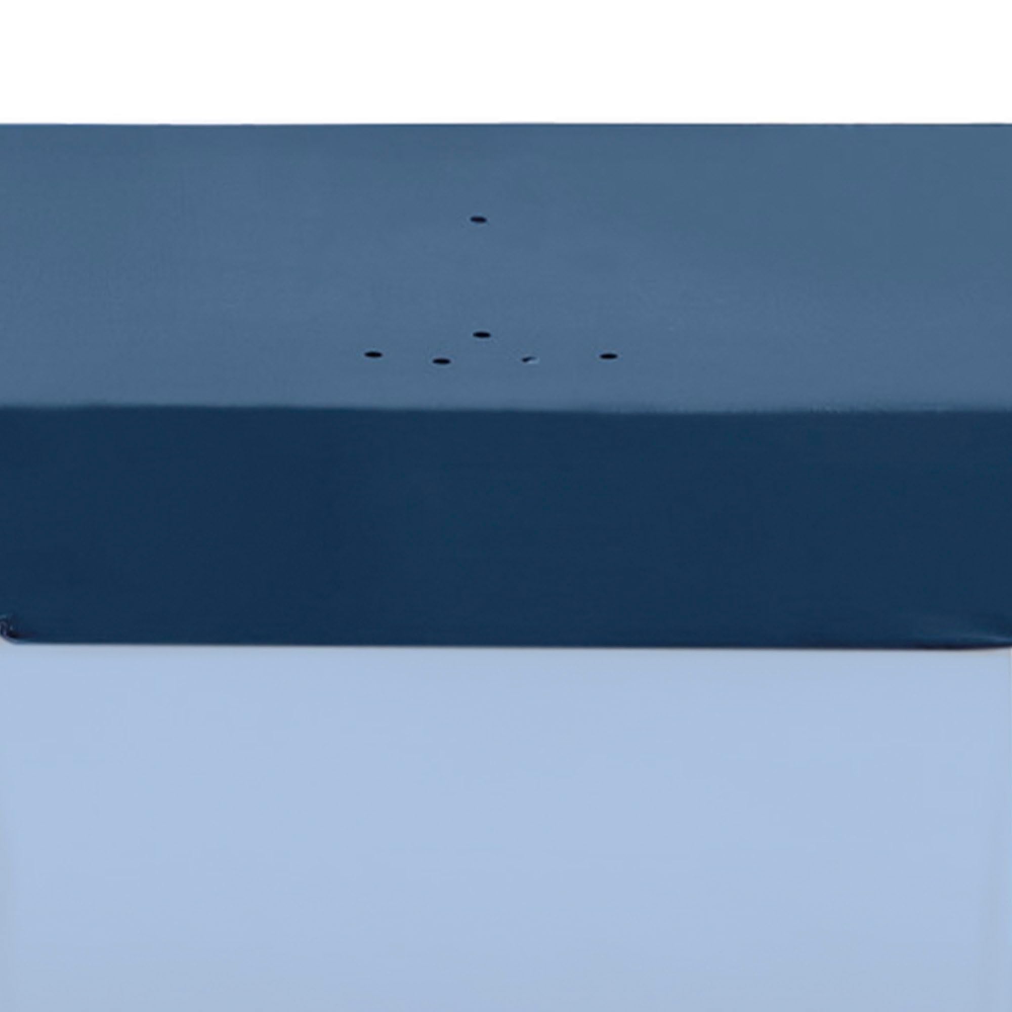 Intex cover next to a chair for scale to show 12-foot coverage